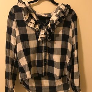 Checker board blouse with ruffle neckline